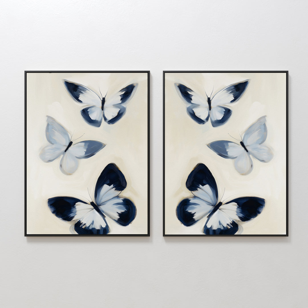 The Midnight Wings Set of 2 features side-by-side framed prints with three abstract blue and white butterflies on light beige—ideal butterfly wall art for modern decor with a hint of Nordic Park elegance.