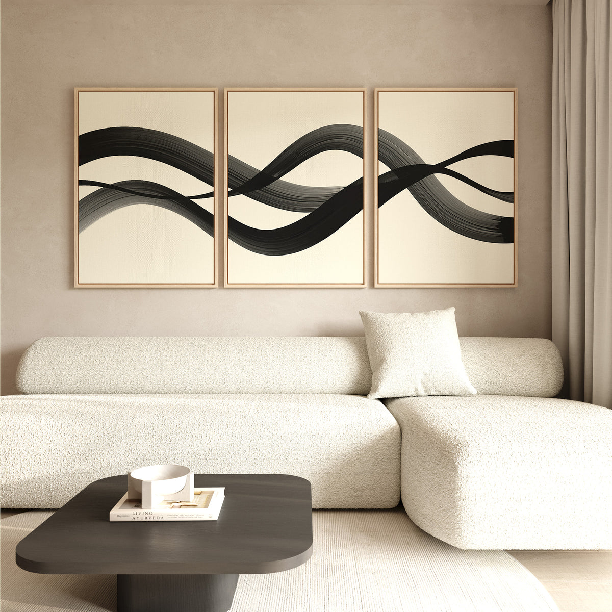 Minimalist living room featuring a light textured sofa with single cushion, dark coffee table, and Fluid Curves Set of 3 wall art above the couch. Soft neutral tones and natural light create a calm, Nordic Park-inspired vibe.