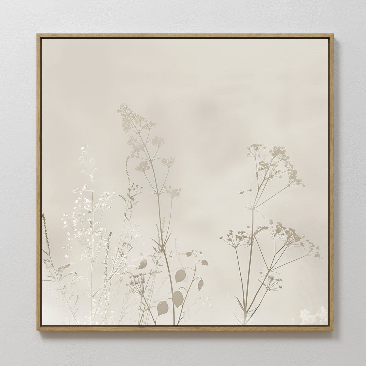 Floral Symphony Abstract Canvas Art: a minimalist wall print with delicate light brown botanical silhouettes on a soft beige background, elegantly framed in wood—perfect decor for your living room.