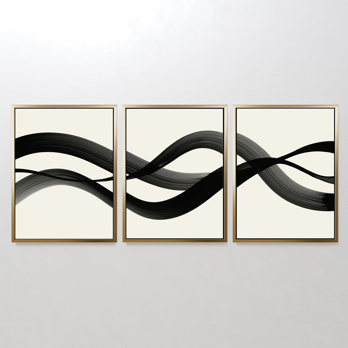 The Fluid Curves Set of 3 features abstract prints with black wavy brushstrokes flowing across a white background, creating striking modern wall art when displayed together.