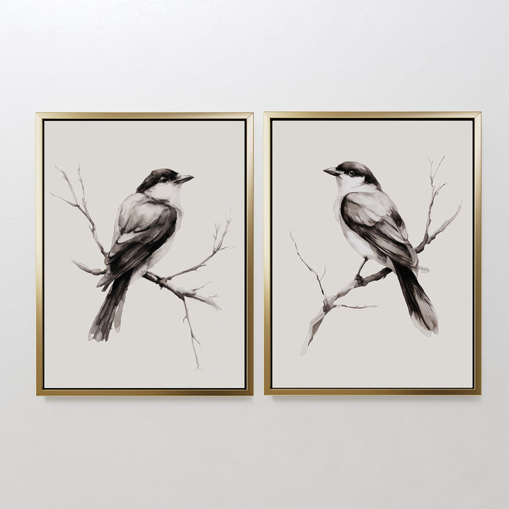 The Still Perch Set of 2 features framed black-and-white bird art prints, each bird facing the center on bare branches. Mounted side by side, theyre ideal for Nordic Park-inspired spaces or those who love neutral wall art.