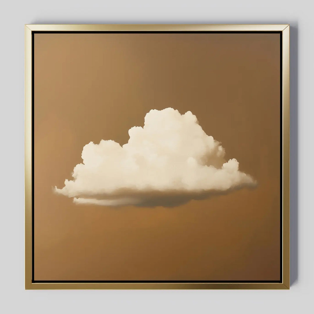 Amber Sky Cloud Canvas Art features a single fluffy white cloud on a warm brown background. Minimalist and elegant, it comes framed in gold with a thin black inner border—perfect for adding style to your bedroom decor.