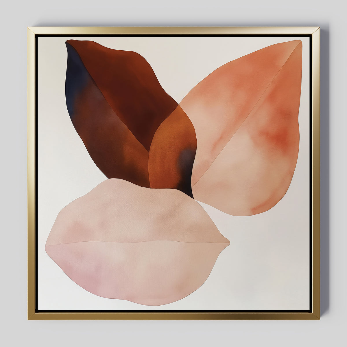 The Autumn Petals Canvas Art showcases three overlapping, softly tinted leaf-like shapes in brown, peach, and blush on a white background, elegantly framed in gold for a minimalist touch.