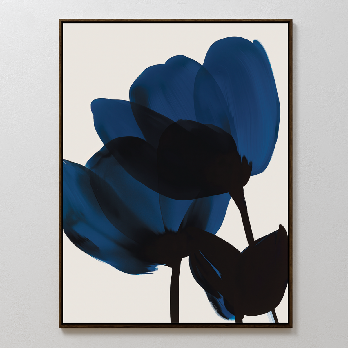 Bloom Abstract Canvas Art showcases minimalist blue and black flower shapes on a white background, elegantly framed and ideal for elevating your living room decor with modern, understated style.