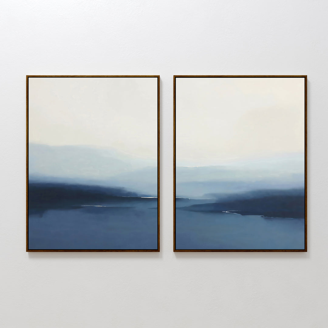 The Blue Valley Mist Set of 2 features framed abstract paintings with soft blue and white tones, perfect as minimalist decor or calming wall art prints to enhance any space.