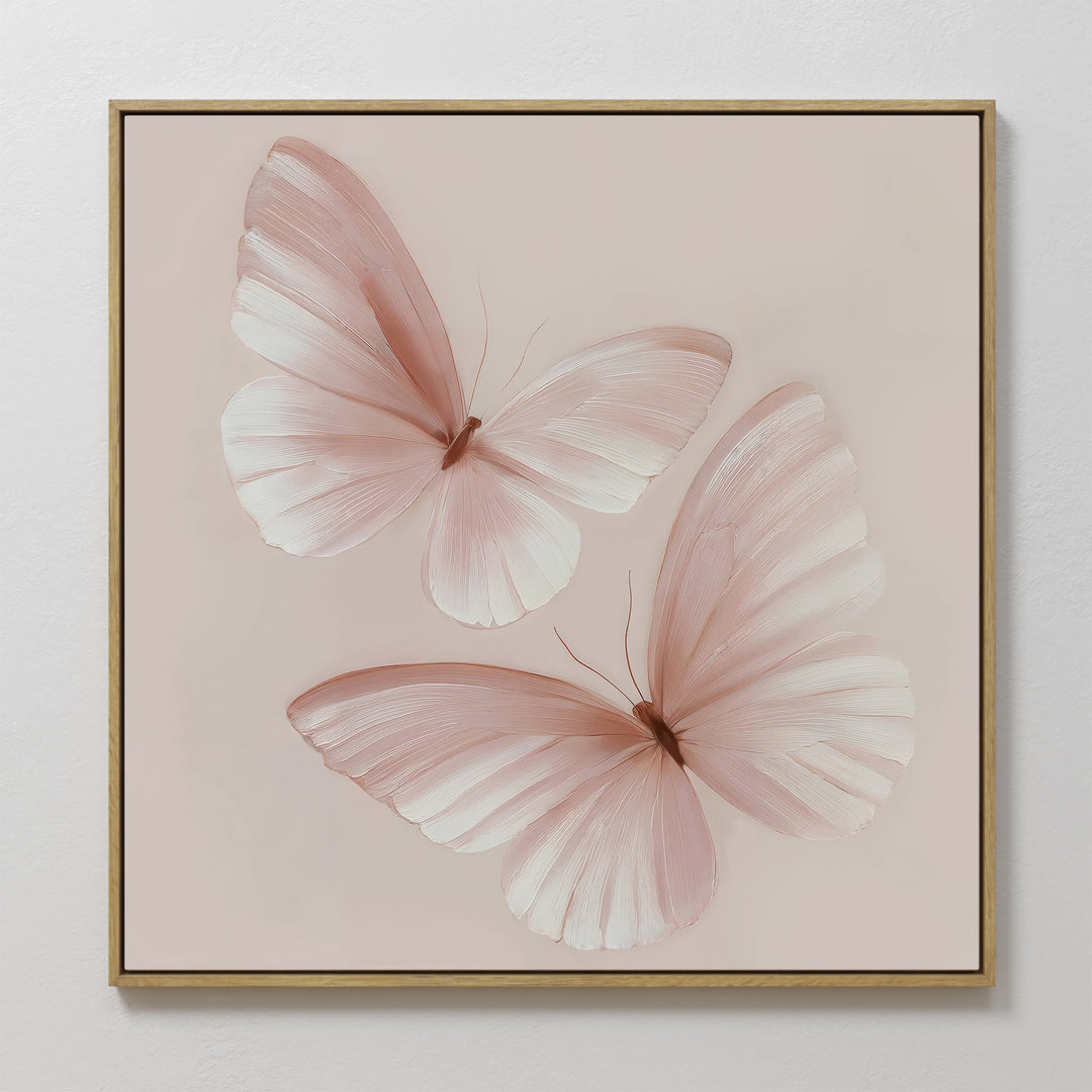 Blush Wings Canvas Art showcases two delicate, light pink butterflies with translucent wings on a soft pastel background—perfect blush pink wall decor for any space.