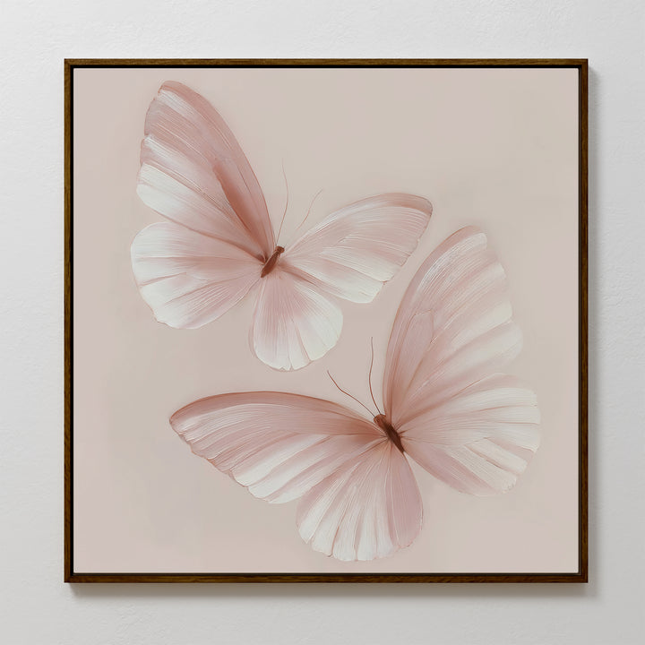 Blush Wings Canvas Art features two pale pink butterflies with delicate, translucent wings on a light beige background—ideal blush pink wall decor for any room.