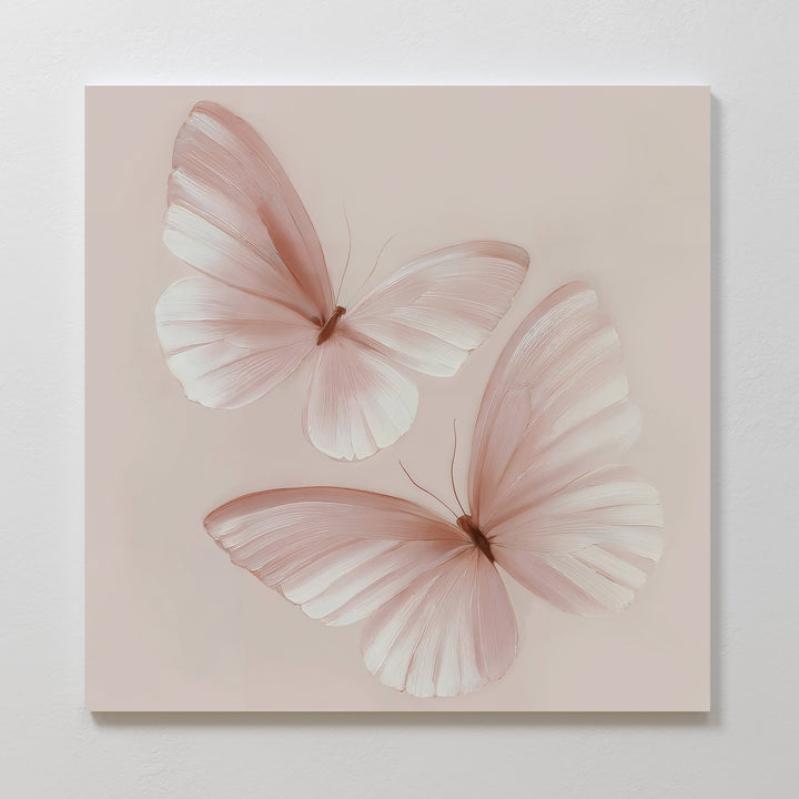 Blush Wings Canvas Art: a square canvas showcasing two delicate light pink butterflies with translucent wings on a soft pale background, perfect for adding minimalistic and gentle blush pink decor to your wall.
