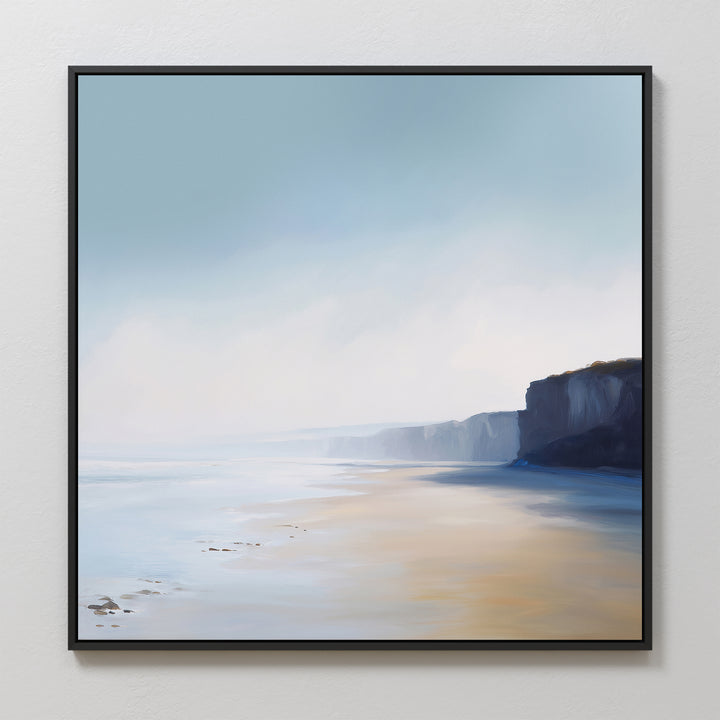 Cliffside Light Canvas Art features a tranquil coastal scene with sandy shore, gentle waves, and distant cliffs under a hazy sky—ideal minimalist wall art to bring calm and serenity to your space.