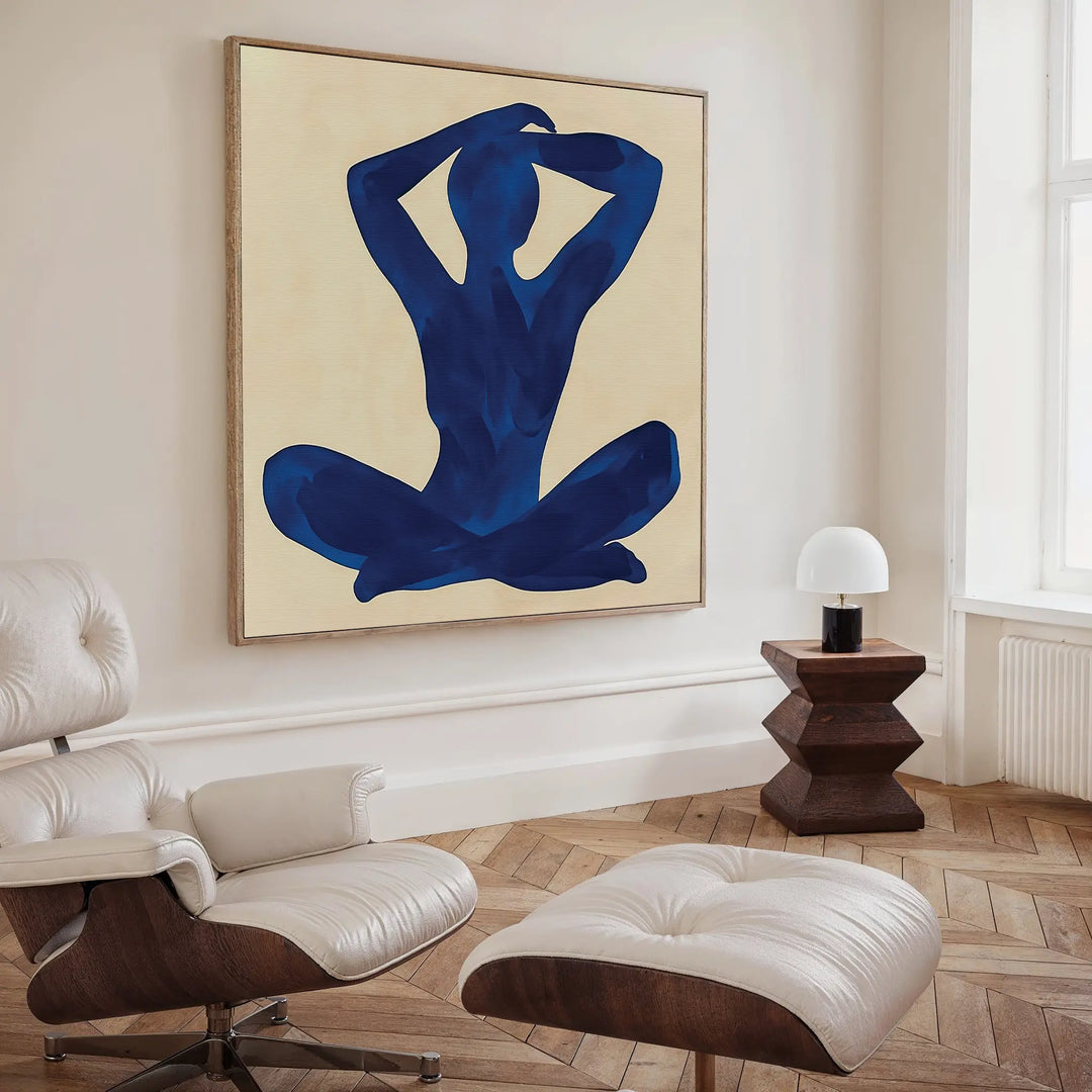 The Cobalt Figure Canvas Art hangs on the wall, showcasing a modern abstract figure print that captures attention.