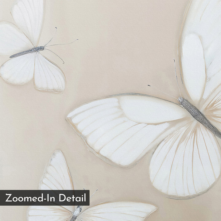 A close-up view of three white butterflies with delicate wings on a soft beige backdrop, perfect as butterfly wall art. Features a Zoomed-In Detail label. Product: Delicate Whites Canvas Art.