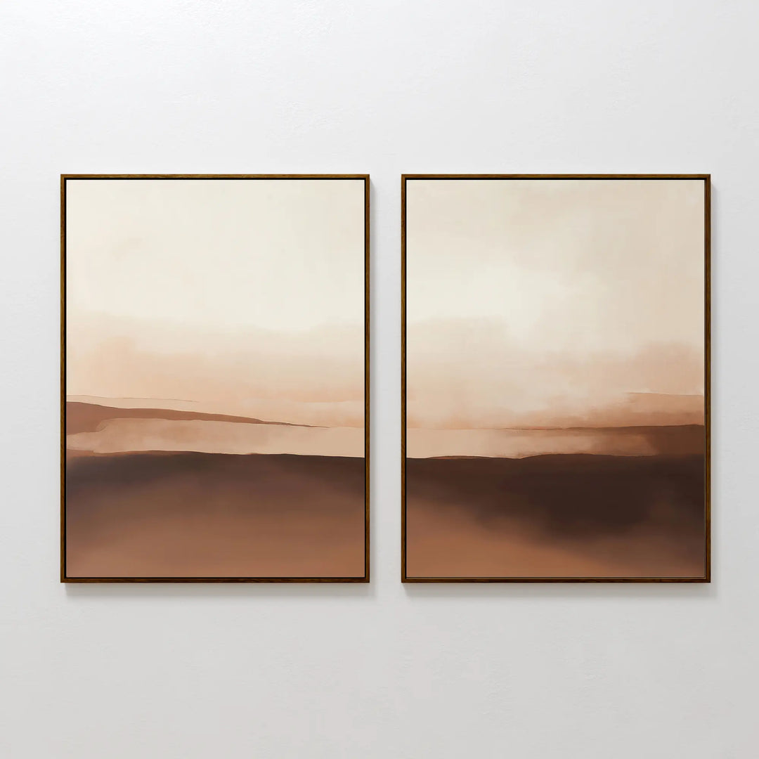 The Desert Landscape Set of 2 features framed minimalist prints in beige and brown, with soft, blurred landscapes and gentle horizontal lines—ideal wall art for neutral interiors.