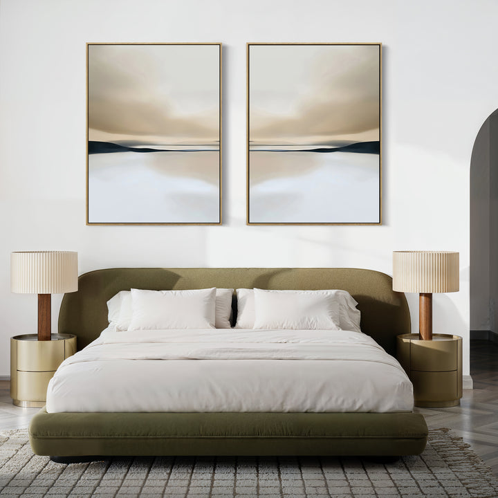 A modern bedroom featuring an olive green upholstered bed with white bedding, beige nightstands with matching lamps, a gray textured rug, and the Desert Quietude Set of 2 minimalist wall art above the headboard inspired by abstract desert landscapes.