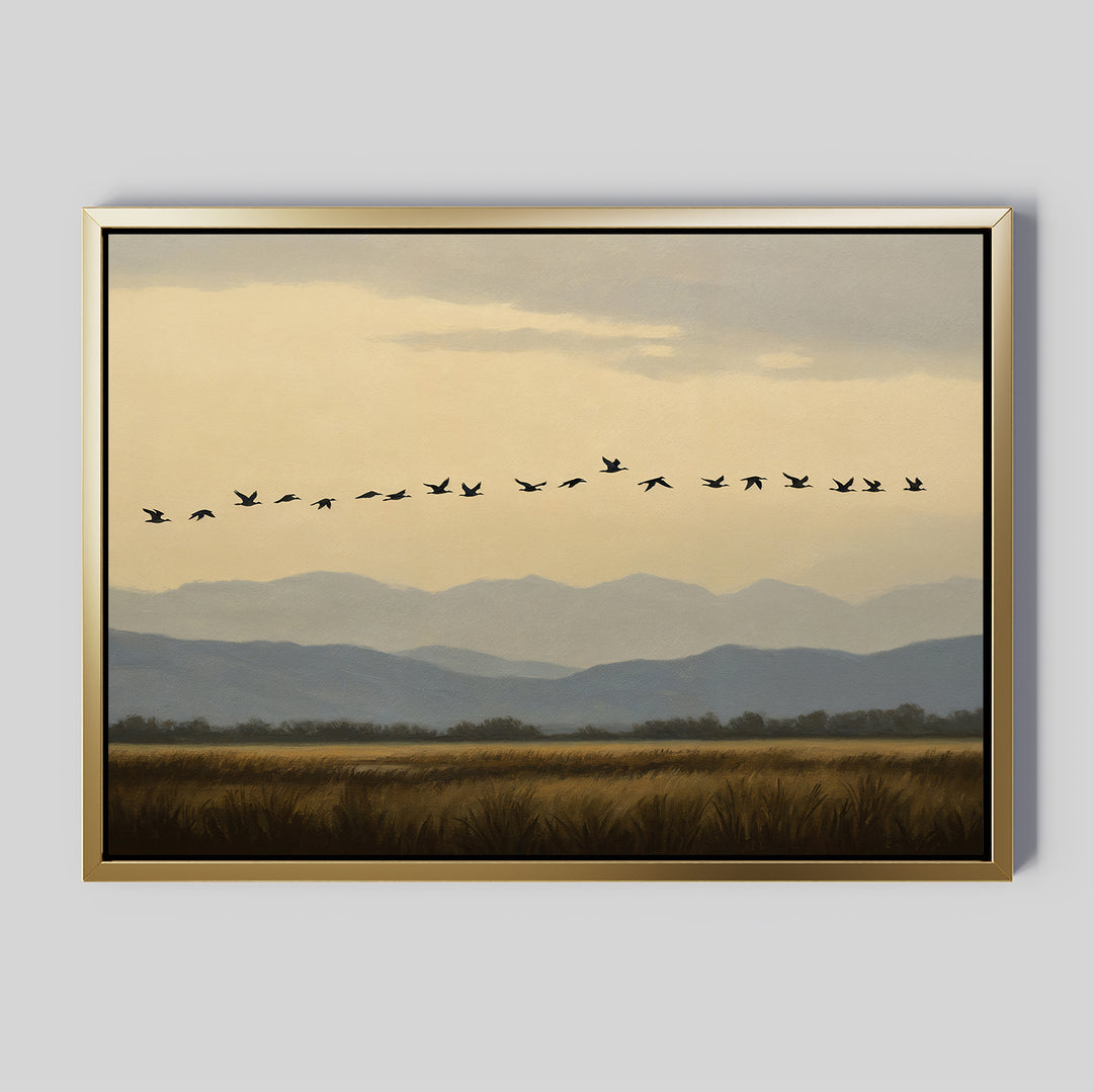 The Distant Flight Canvas Art features birds soaring over grassy fields with blue mountains and a cloudy sky, capturing the serene beauty of Nordic Park.