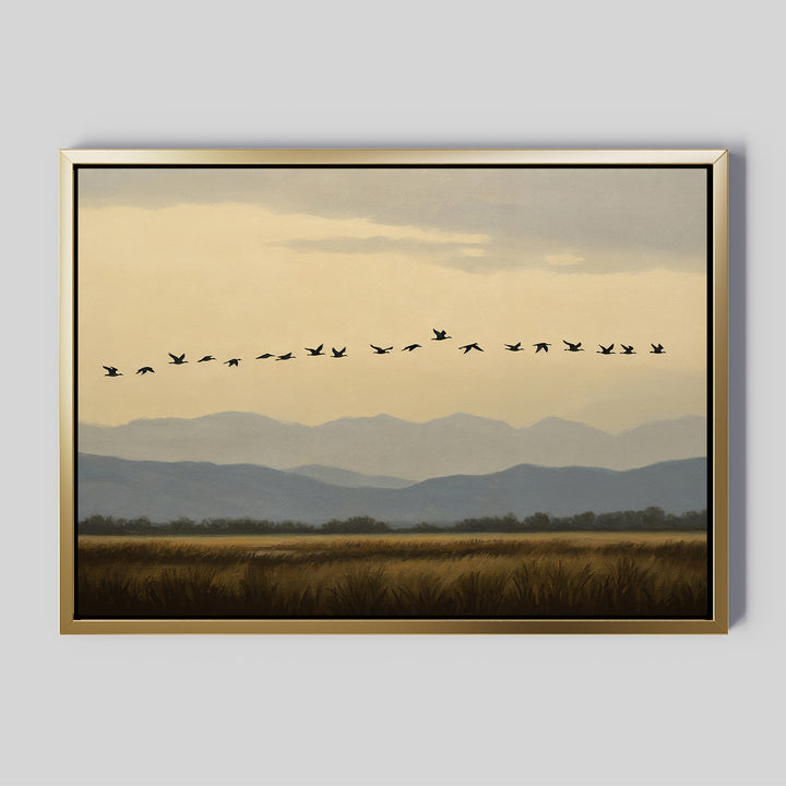 The Distant Flight Canvas Art features birds soaring over grassy fields with blue mountains and a cloudy sky, capturing the serene beauty of Nordic Park.