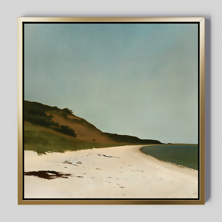 The Drift Shore Canvas Art features a serene beach with white sand, gentle waves, and a grassy hill beneath a clear blue sky—ideal minimalist wall decor for any space.