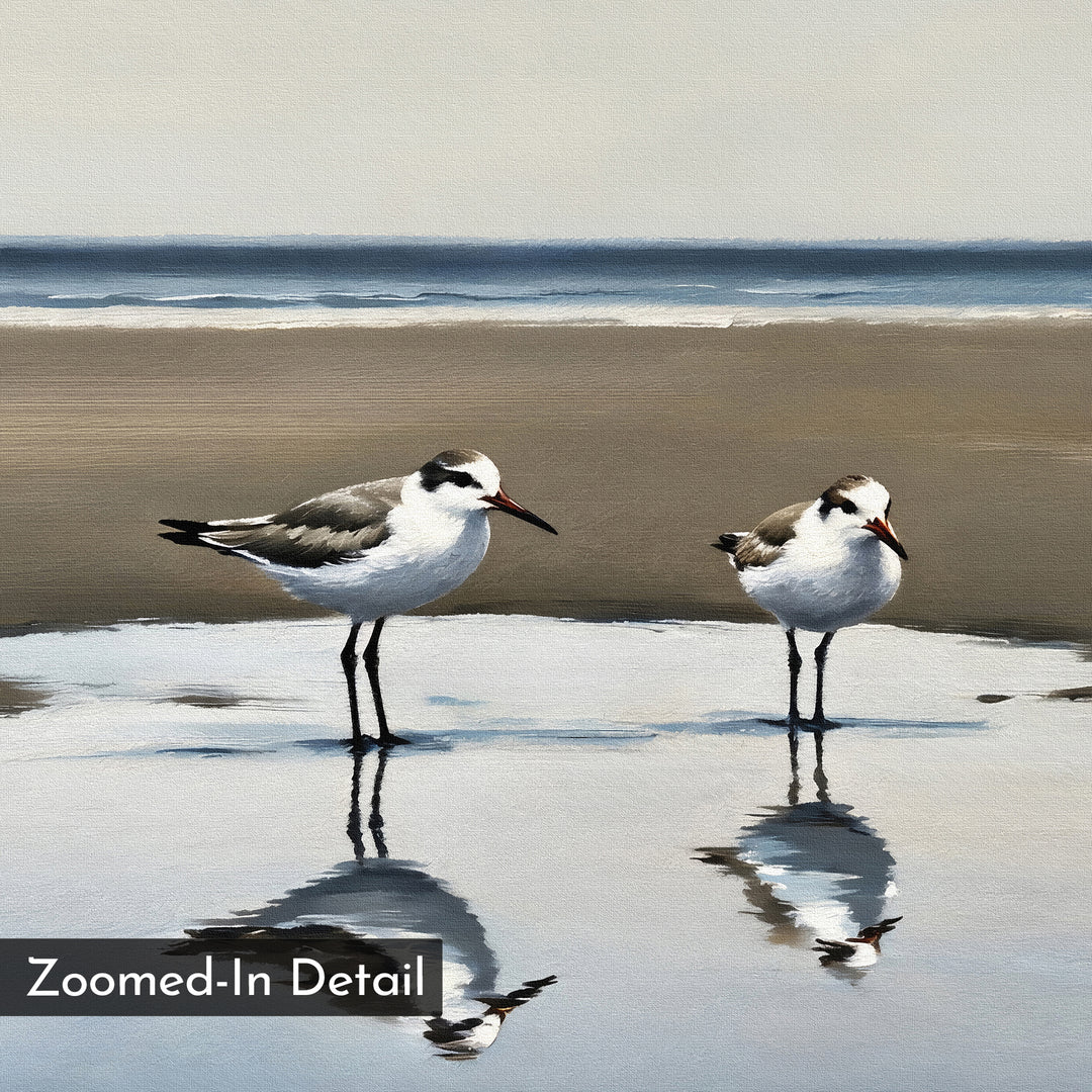 Two seagulls stand in shallow beach water, their reflections shimmering on wet sand beneath a tranquil sea and muted sky. This striking minimalist piece, titled Drifted Calm Canvas Art, features a "Zoomed-In Detail" label in the lower left corner.
