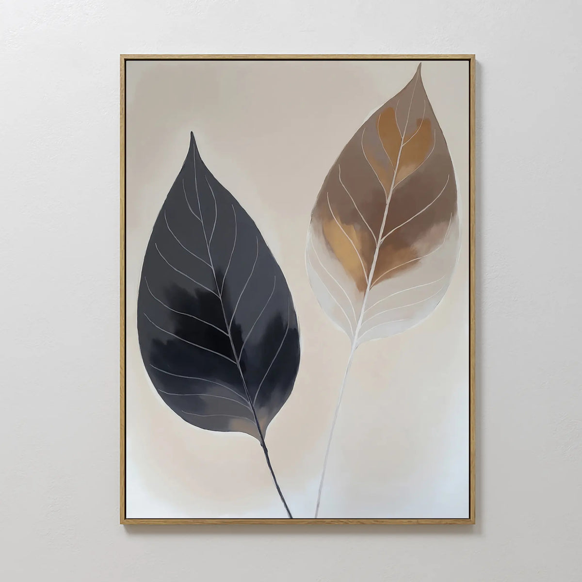 The Dual Leaf Study Canvas Art features two large leaves—one blue-gray, one brown with golden hues and white veins—on a light background. Framed in thin gold, it’s perfect modern wall art for bedroom decor.