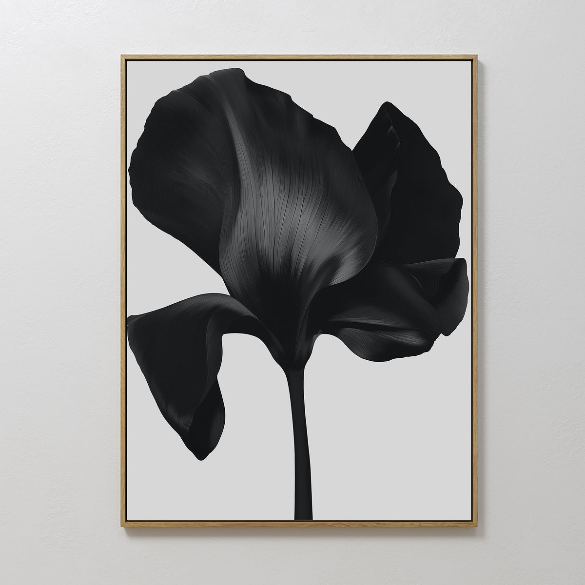Eclipse Bloom Canvas Art features a close-up of a dark abstract flower with bold petals on a light background—an ideal minimalist piece to elevate your living room decor.