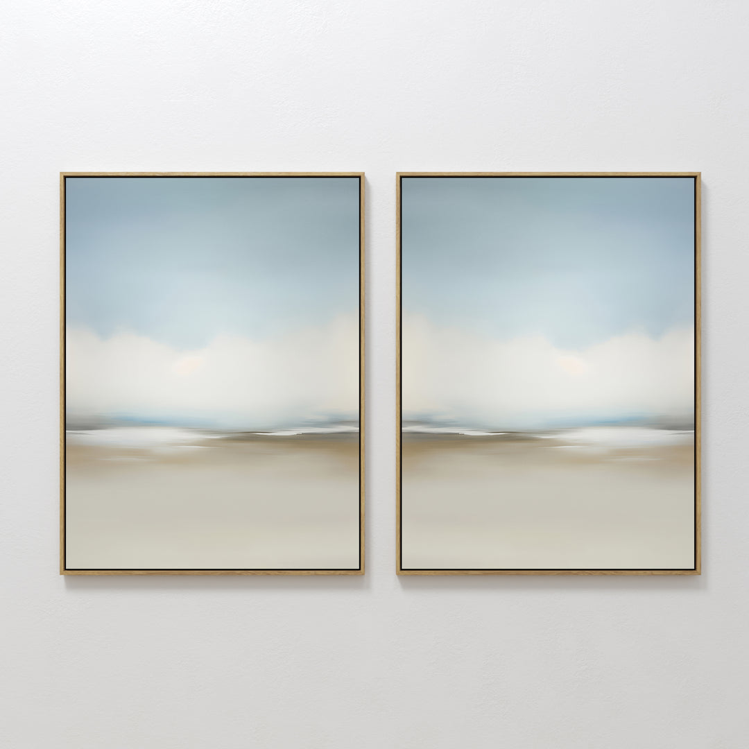 The Faded Silence Set of 2 features large, minimalist wall art with soft, blurred tones of blue, beige, and white, evoking a tranquil abstract landscape—perfect modern decor for a serene, stylish space.