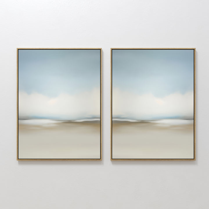 The Faded Silence Set of 2 features large, minimalist wall art with soft, blurred tones of blue, beige, and white, evoking a tranquil abstract landscape—perfect modern decor for a serene, stylish space.