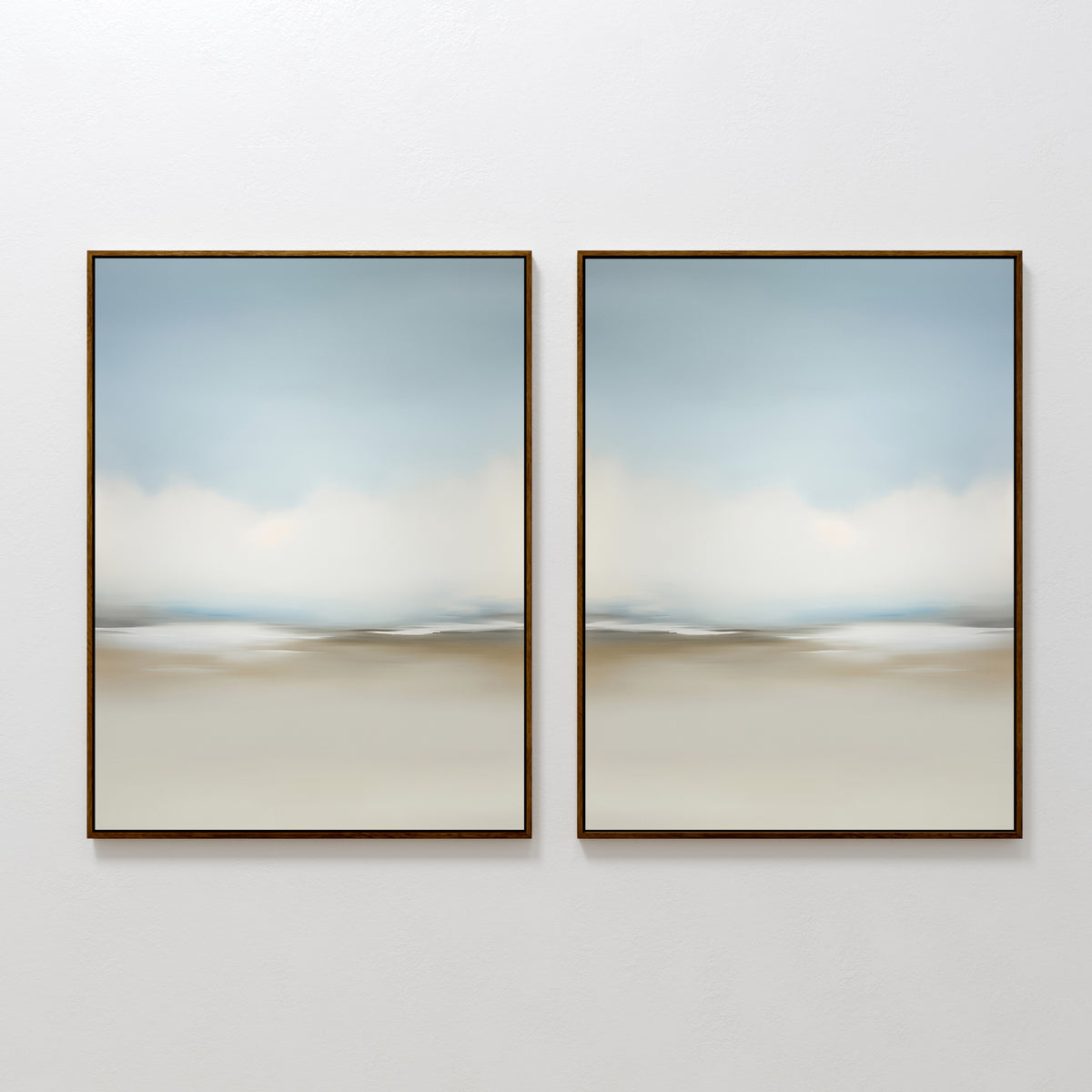 The Faded Silence Set of 2 features framed abstract wall art in soft, blurred blue and beige tones, hanging side by side to create a calm, minimalist vibe—perfect for modern decor.
