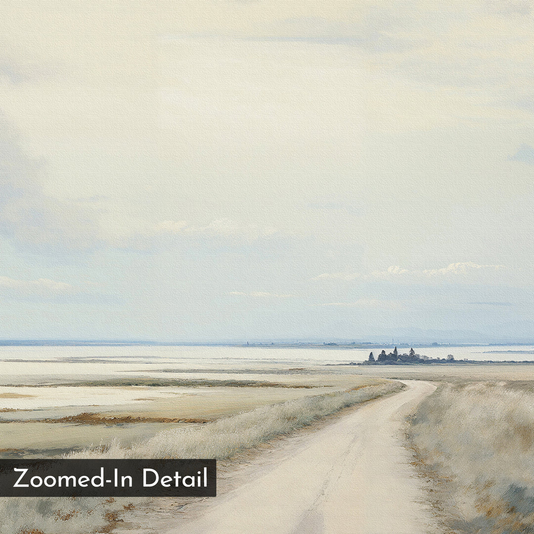 A winding dirt road cuts through dry grass toward distant buildings beneath a pale sky in "Far Light Canvas Art." Its soft, painted texture creates serene, minimalist decor. A label reads “Zoomed-In Detail.”.
