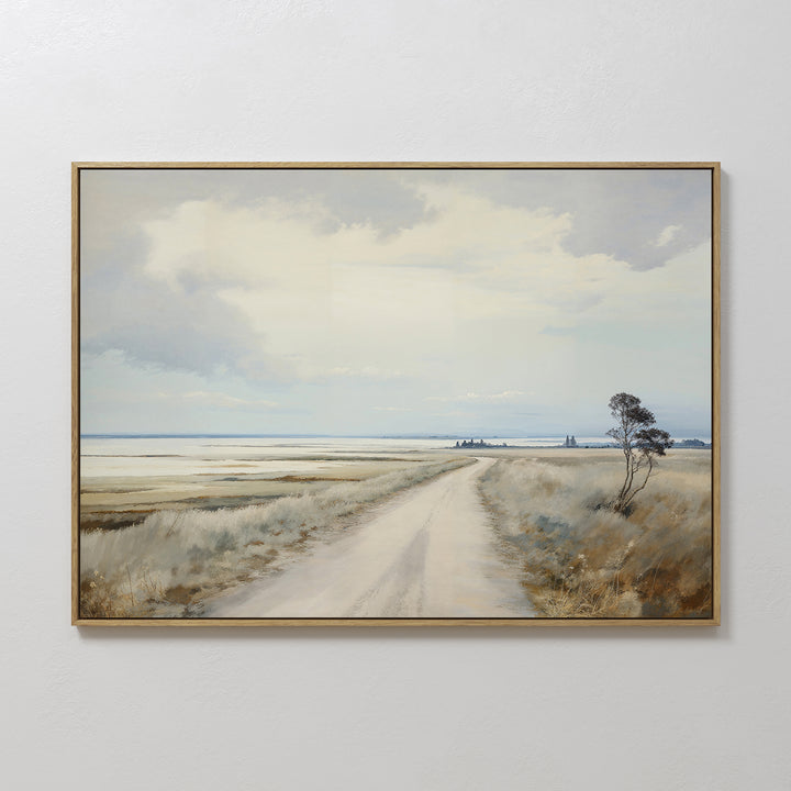 Far Light Canvas Art features a rural landscape with a dirt road, grassy fields, distant buildings, and a single tree under a cloudy sky. Its soft, muted colors make it ideal for minimalist decor and evoke calm simplicity.