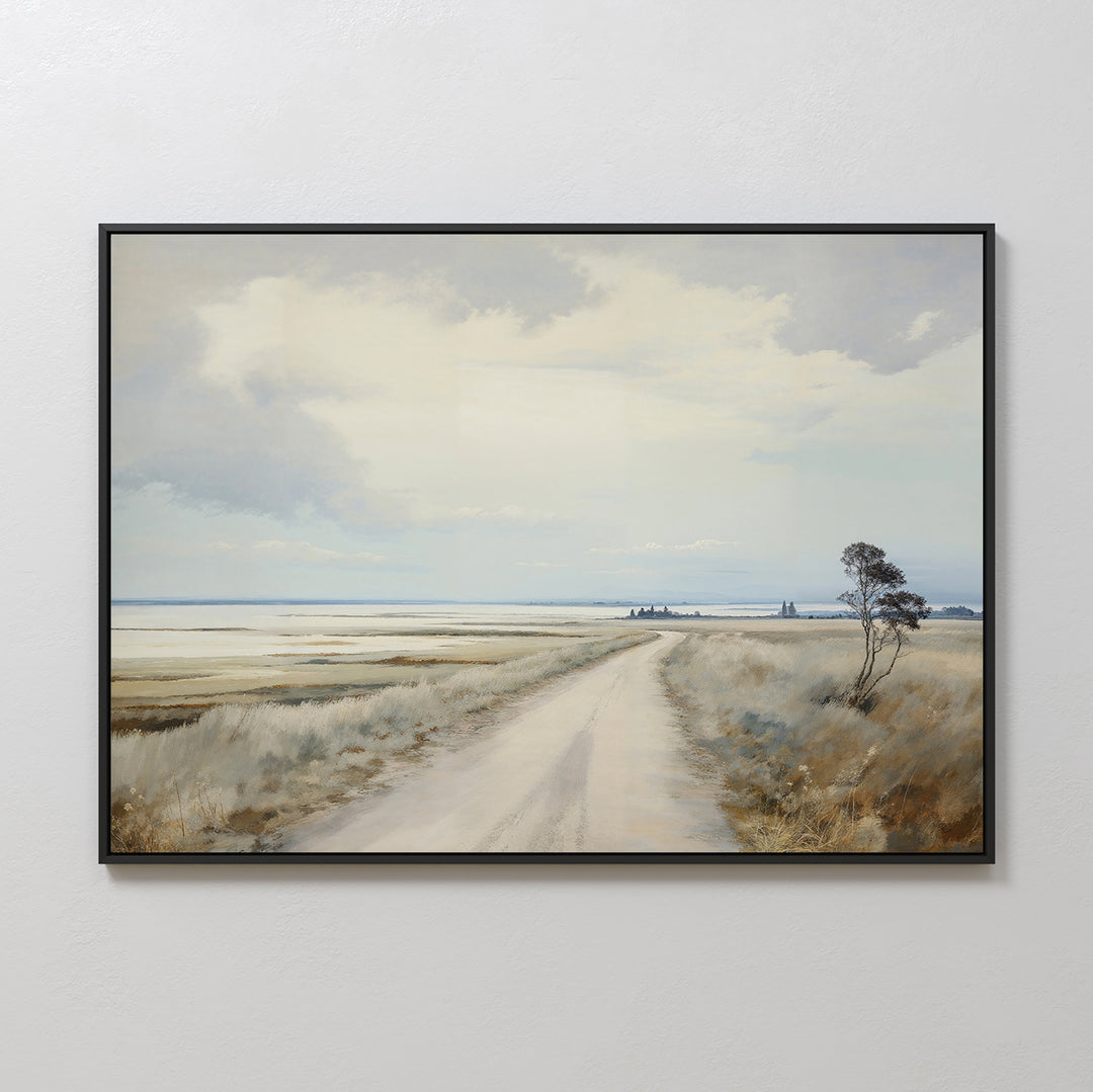 Far Light Canvas Art: Framed canvas with a dirt road winding through grassy fields beneath a cloudy sky; minimalist wall art featuring subtle trees and distant buildings—ideal for modern decor.