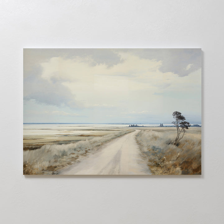 Far Light Canvas Art captures a quiet dirt road winding through grassy plains under cloudy skies, with distant and foreground trees—ideal minimalist decor or serene wall art for any space.