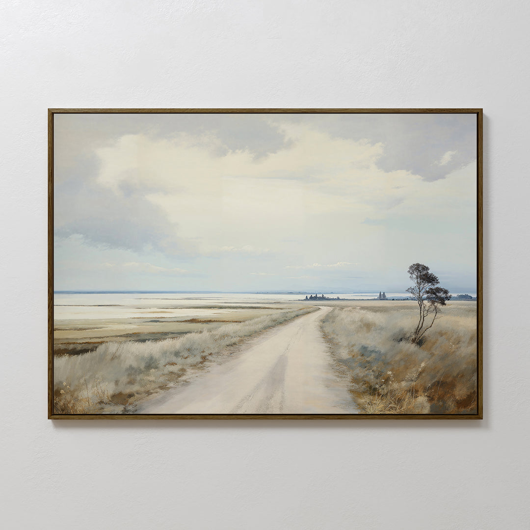 Far Light Canvas Art features a serene rural landscape with a dirt road, grassy fields, and trees beneath a cloudy sky. Its muted tones make it an ideal choice for minimalist home decor.