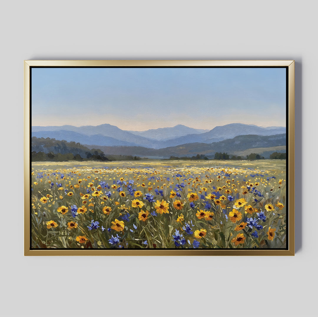 Fields of Color Canvas Art features a vibrant field of yellow and blue wildflowers, green hills, and distant blue mountains under a clear sky—perfect for bringing modern style to your home.