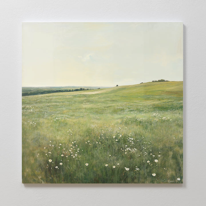 The Floral Meadow Canvas Art features a green meadow with wildflowers beneath a pale sky, gentle hills, and scattered trees—ideal wall decor to bring nature’s beauty into your living room.