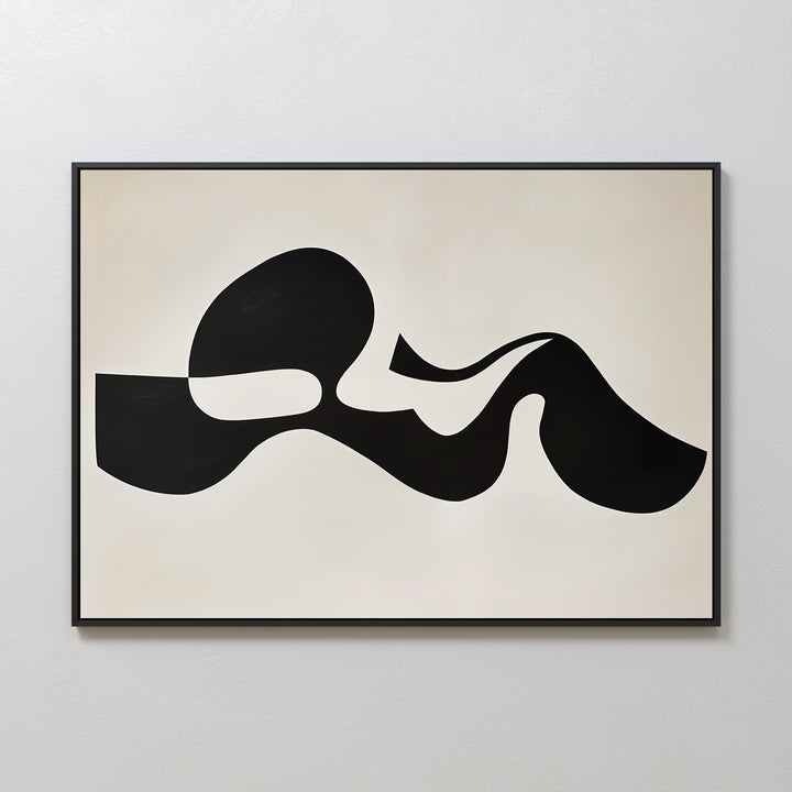 The Fluid Forms Abstract Canvas Art showcases bold black organic shapes on a light beige backdrop, framed in sleek black—an ideal minimalist piece for modern wall décor.