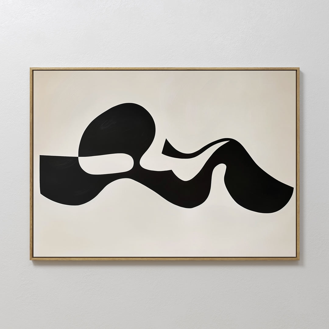 Fluid Forms Abstract Canvas Art features a bold, black flowing shape with rounded edges on white, framed in light wood—ideal minimalist wall decor for any modern space.