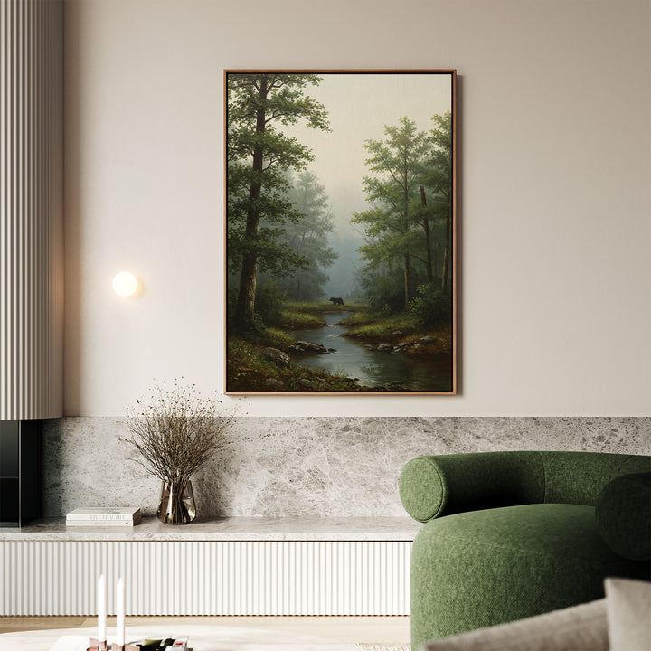 A bright, modern living room features a green armchair and the Forest Passage Canvas Art depicting a forest stream above. A vase of dried plants and books on the marble bench below add natural charm to the space.
