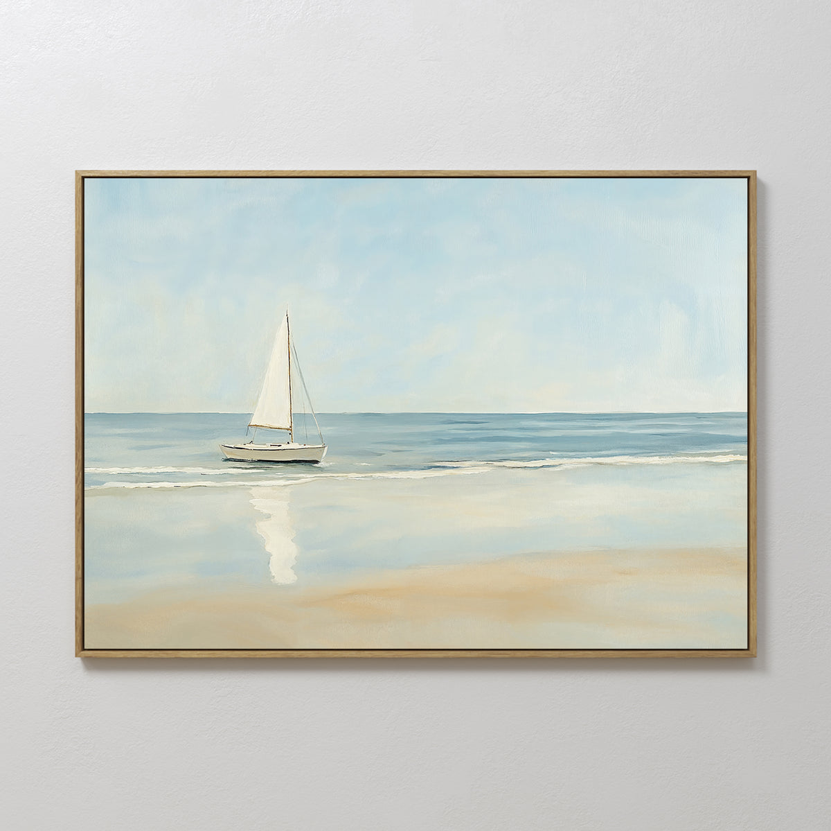 Freedoms Call Canvas Art features a serene white sailboat on calm blue water near a sandy shore, its reflection shimmering below. This coastal wall print adds peaceful elegance and tranquility to any home decor.