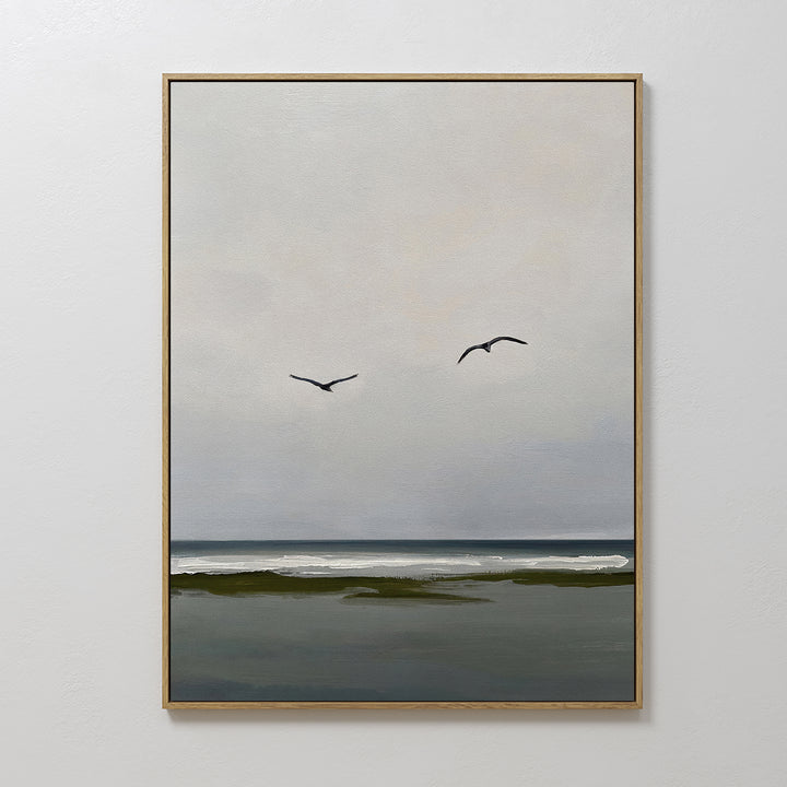 The Freeflight Canvas Art features a calm seascape with two birds soaring above gentle waves and a dark shoreline—a minimalist piece perfect for bringing serene style to your wall decor.