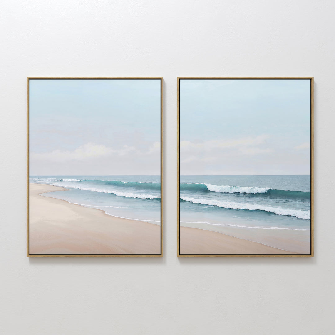 The Gentle Surf Set of 2 features framed beach scenes with gentle waves and soft sand, creating perfect coastal wall art that brings peaceful, seaside charm to any living room decor.