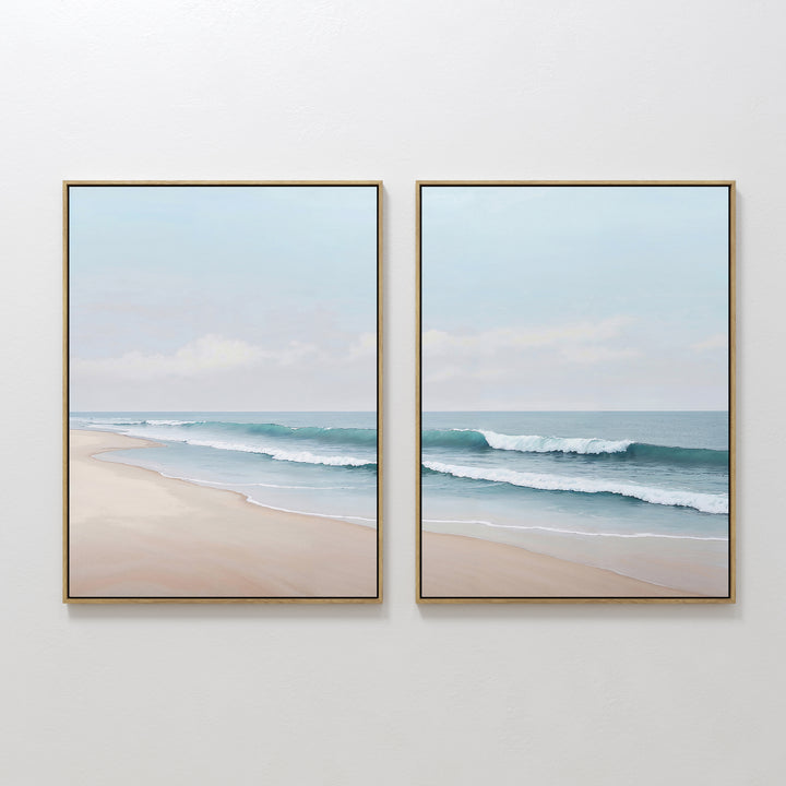The Gentle Surf Set of 2 features framed beach scenes with gentle waves and soft sand, creating perfect coastal wall art that brings peaceful, seaside charm to any living room decor.