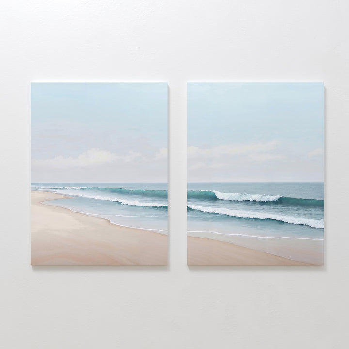 The Gentle Surf Set of 2 features canvas paintings of a tranquil beach, gentle waves, and a pale blue sky—ideal coastal wall art to add calm and serenity to your living room or bedroom decor.