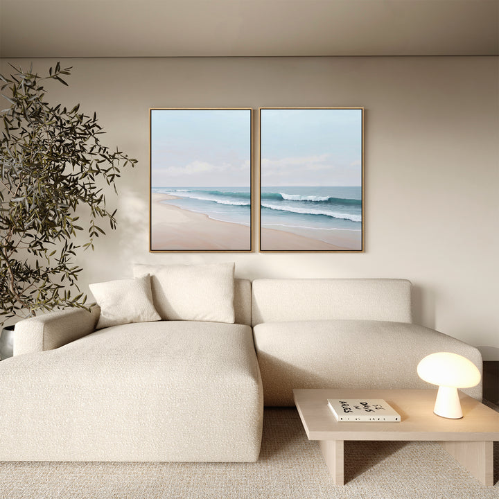 A living room featuring a couch, table, and the Gentle Surf Set of 2 as tasteful decor, creates a cozy and inviting atmosphere.