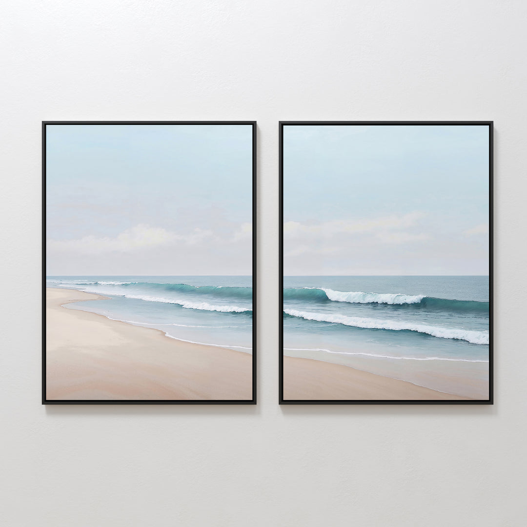 The Gentle Surf Set of 2 features framed paintings with soft waves meeting a sandy shore under a light blue sky, creating a serene coastal seascape ideal for bedroom or living room decor.