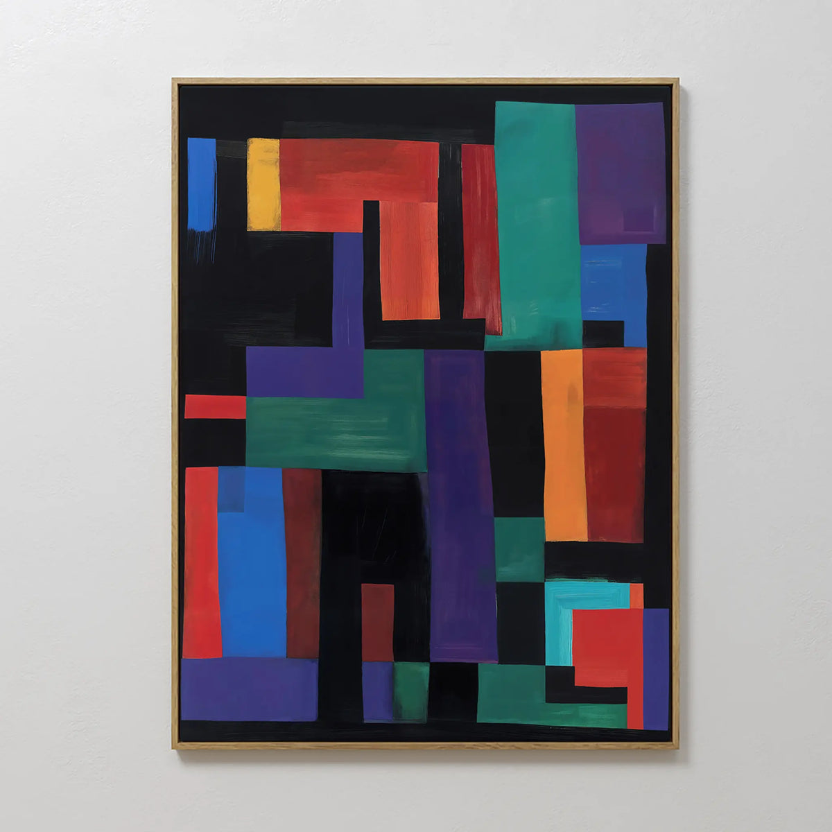 The Geometric Mosaic Canvas Art features bold, overlapping rectangles in rich tones against a black background, elegantly gold-framed and displayed on a white wall—an ideal modern living room accent.