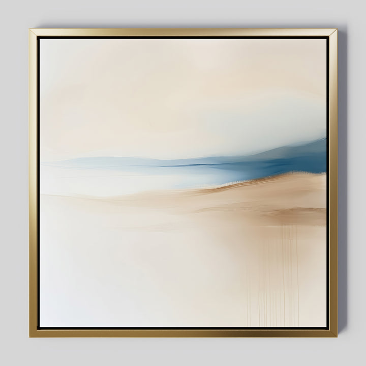 Golden Drift Canvas Art features minimalist abstract design in a gold frame, with soft beige and blue tones that evoke tranquility. Perfect for bedroom or living room decor, its smooth lines create an elegant, dreamy atmosphere.
