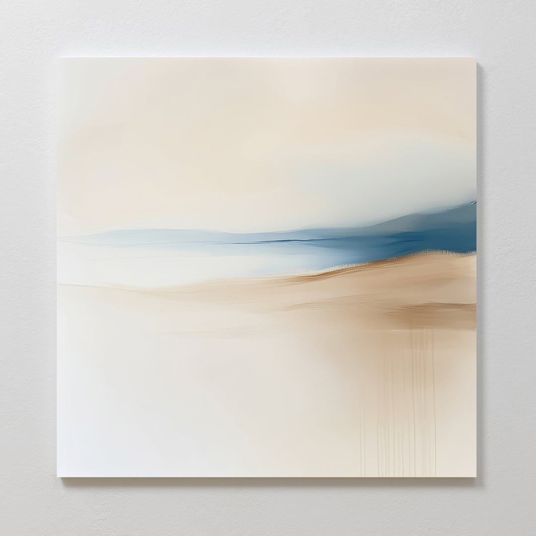 Golden Drift Canvas Art features soft beige, tan, and blue tones blended in a minimalist abstract style, evoking a serene landscape. Perfect for adding calm to bedroom or living room decor.