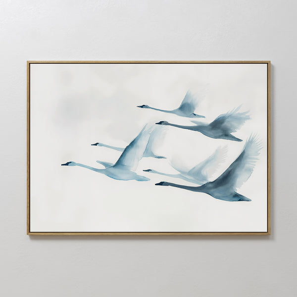 Graceful Flock Canvas Art showcases six blue-toned swans flying in formation on a white background, featuring soft watercolor brushstrokes—a stylish modern nature decor piece ideal for fans of Nordic wall art.