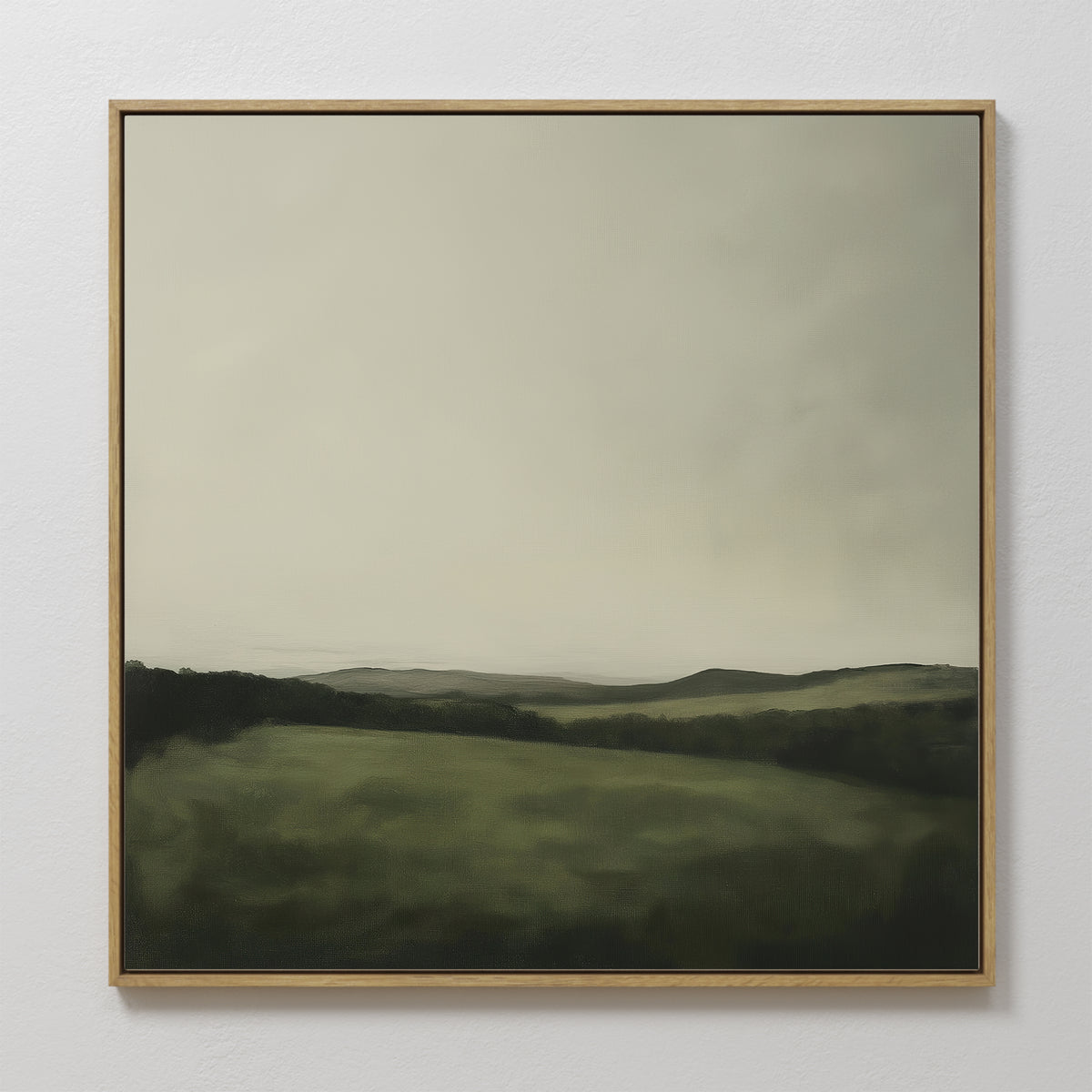 Add tranquil style to your living room with the Hills at Dusk Canvas Art—a framed minimalist print featuring misty rolling green hills beneath a soft, overcast sky for a serene, calming decor accent.