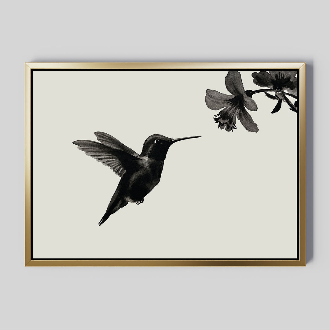 The Hummingbird Motion Canvas Art features a black hummingbird print on a minimalist black-and-white background, elegantly framed in thin gold—ideal modern decor or minimalist wall art for your light gray space.