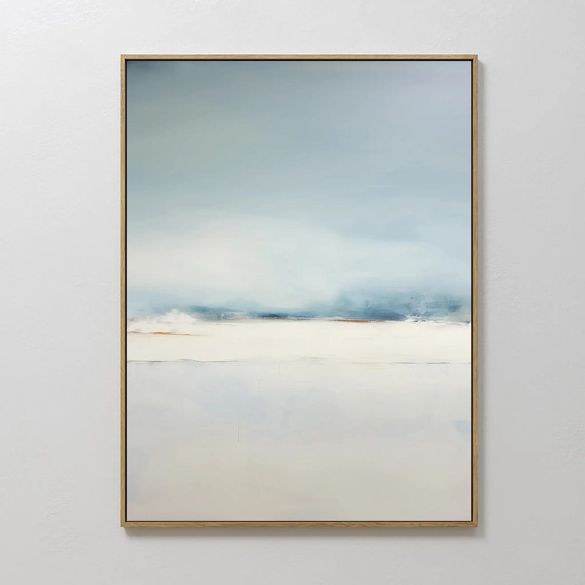 The Misty Morning Canvas Art – Vertical is a framed minimalist abstract painting in soft blue and white, evoking tranquil skies meeting a hazy horizon—perfect for lovers of minimalist wall art.